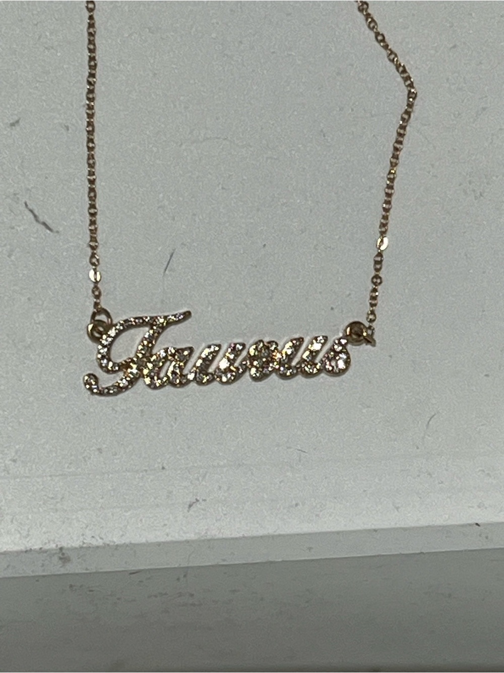 Gold Tone “Taurus” Necklace